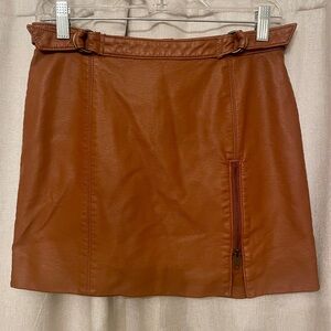Free People Faux Leather Mini Skirt in Cognac. Zipper Vent and Buckles